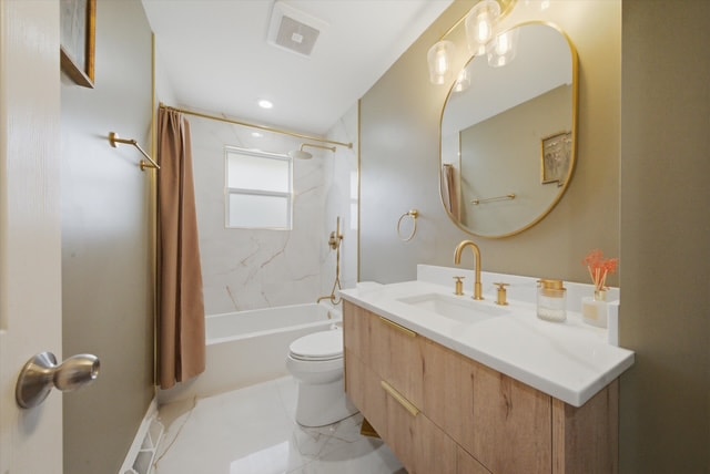 Newly remodeled main bathroom with gold fixtures, marble tile, and modern vanity